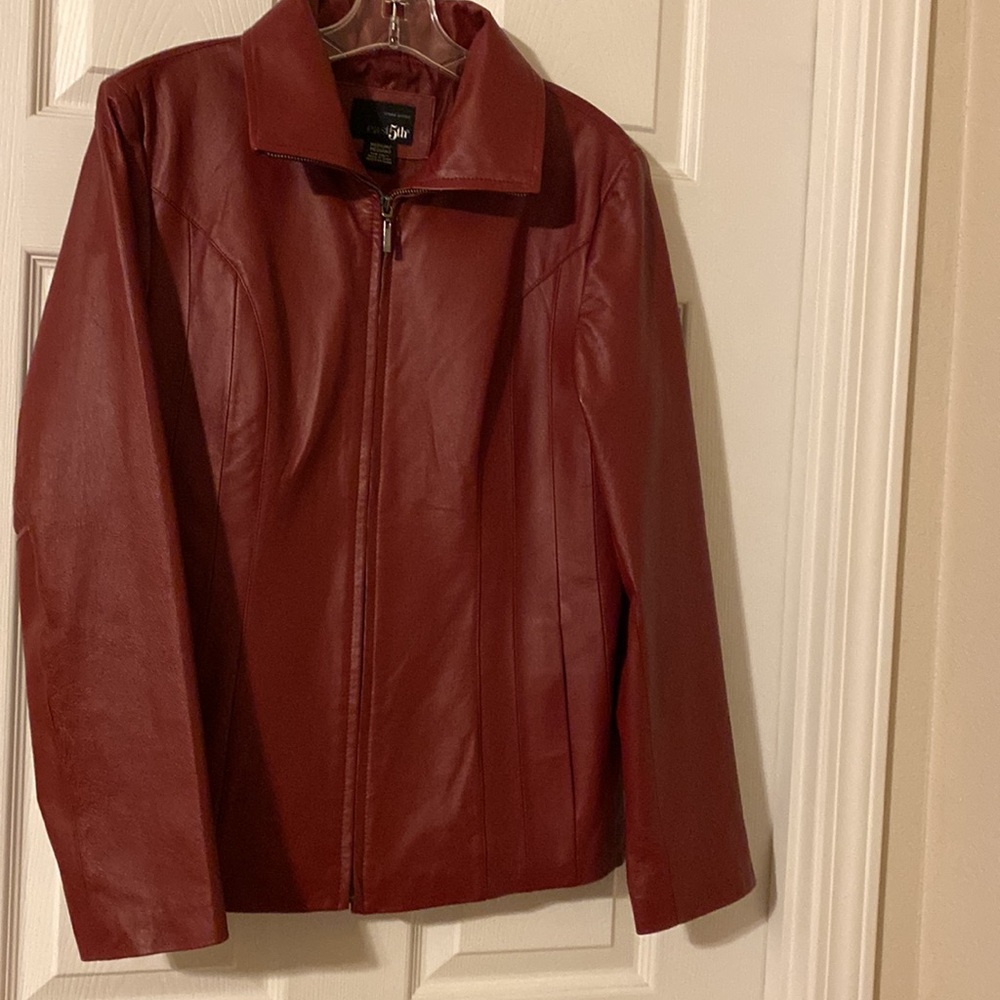 Leather jacket size M. Red. Zip closure. High neck.
